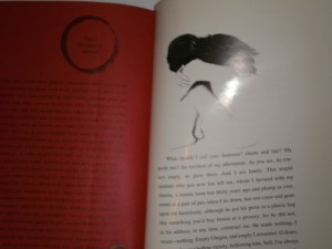 The end of the red section and the beginning of the white section.