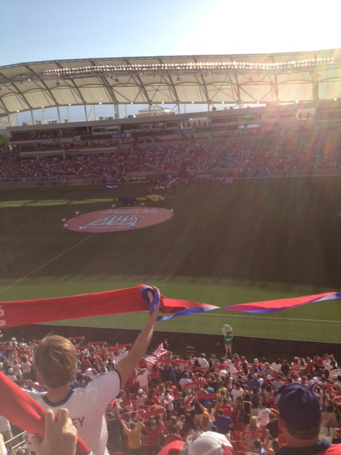 The two teams coming out onto the pitch at the beginning of the match.