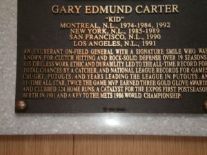 A close-up of Gary Carter's plaque detailing his importance to the 1986 Mets.