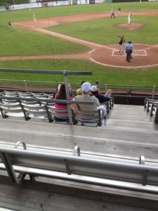 A scene from the game. Note the scout holding the radar gun in the first row.