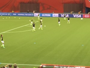 The U.S. warming up before the match. Twenty years from now in footage from the tournament Nike's ridiculous neon-and-black uniforms are going to look super-dated.